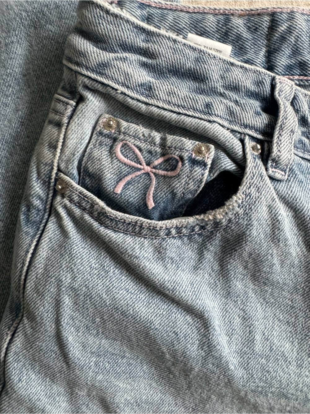 PacSun Light Blue Denim Jeans with Pink Bow Accent